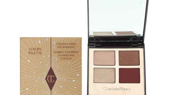 Charlotte Tilbury Luxury Eyeshadow Palette in Fire Rose - 5.2g. Stunning blend of warm hues for captivating eye looks. Perfect for day and night glam.