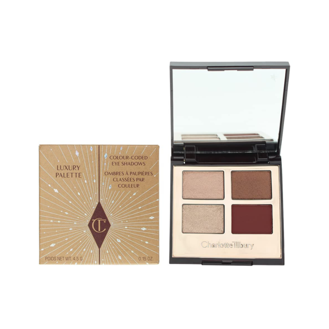 Charlotte Tilbury Luxury Eyeshadow Palette in Fire Rose - 5.2g. Stunning blend of warm hues for captivating eye looks. Perfect for day and night glam.